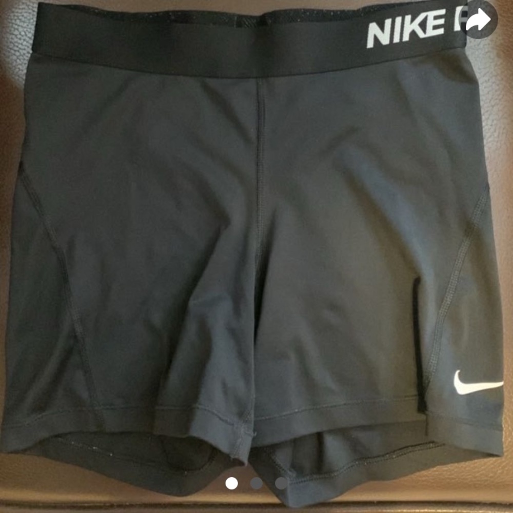 Nike pro size Medium logo is cracking peeling